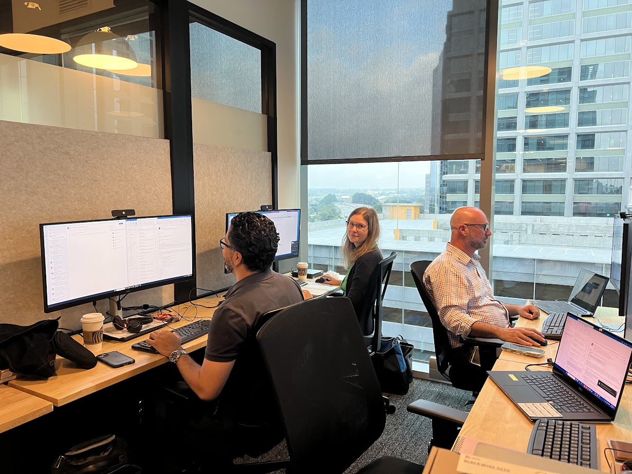 Analytics team collaborating in enterprise office